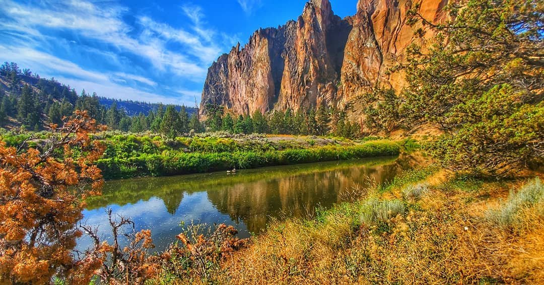 Smith Rock cliffs reflected in the Crooked River in Central Oregon