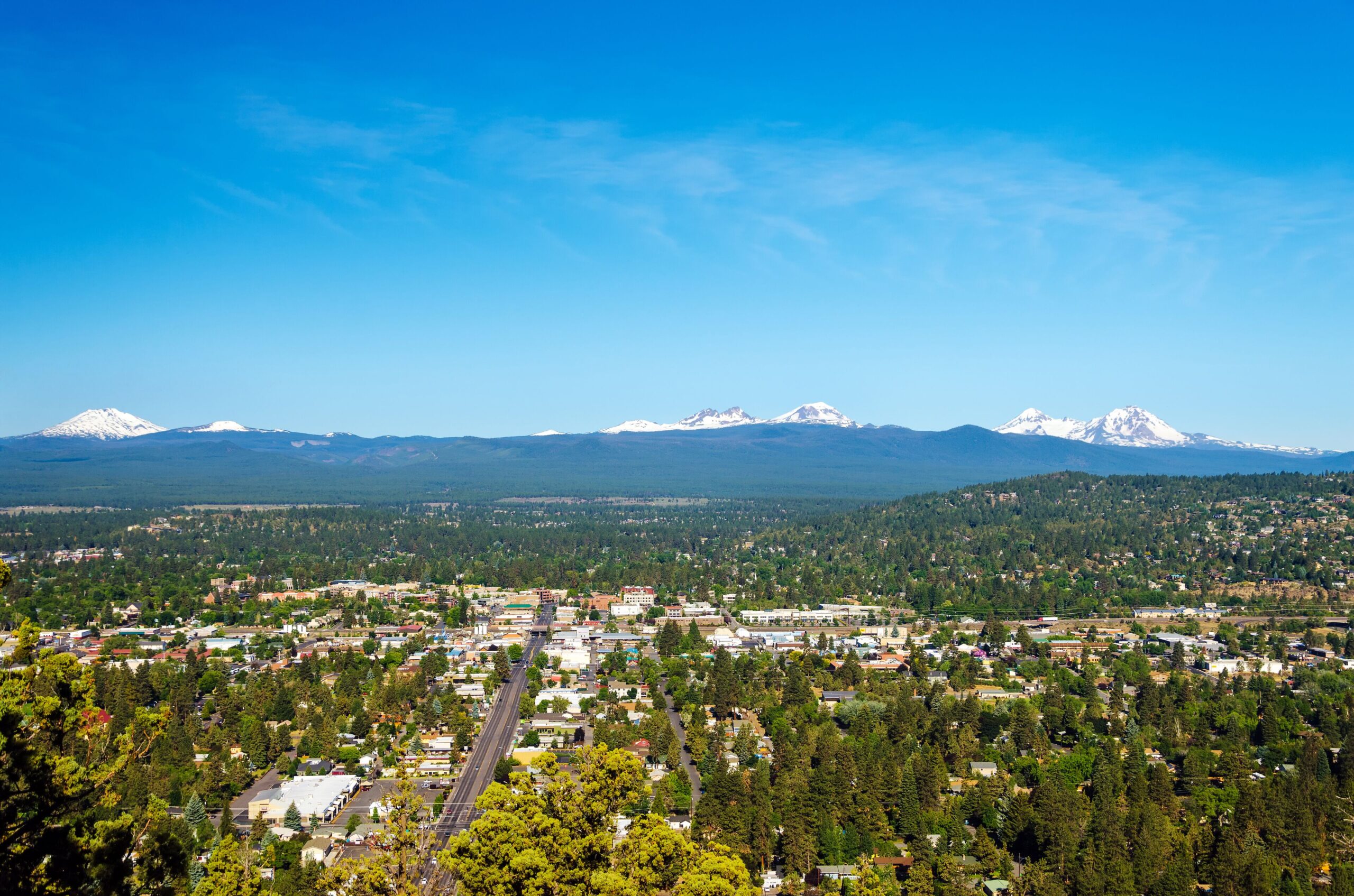 Bend neighborhoods beneath the snow-covered Cascade mountain skyline